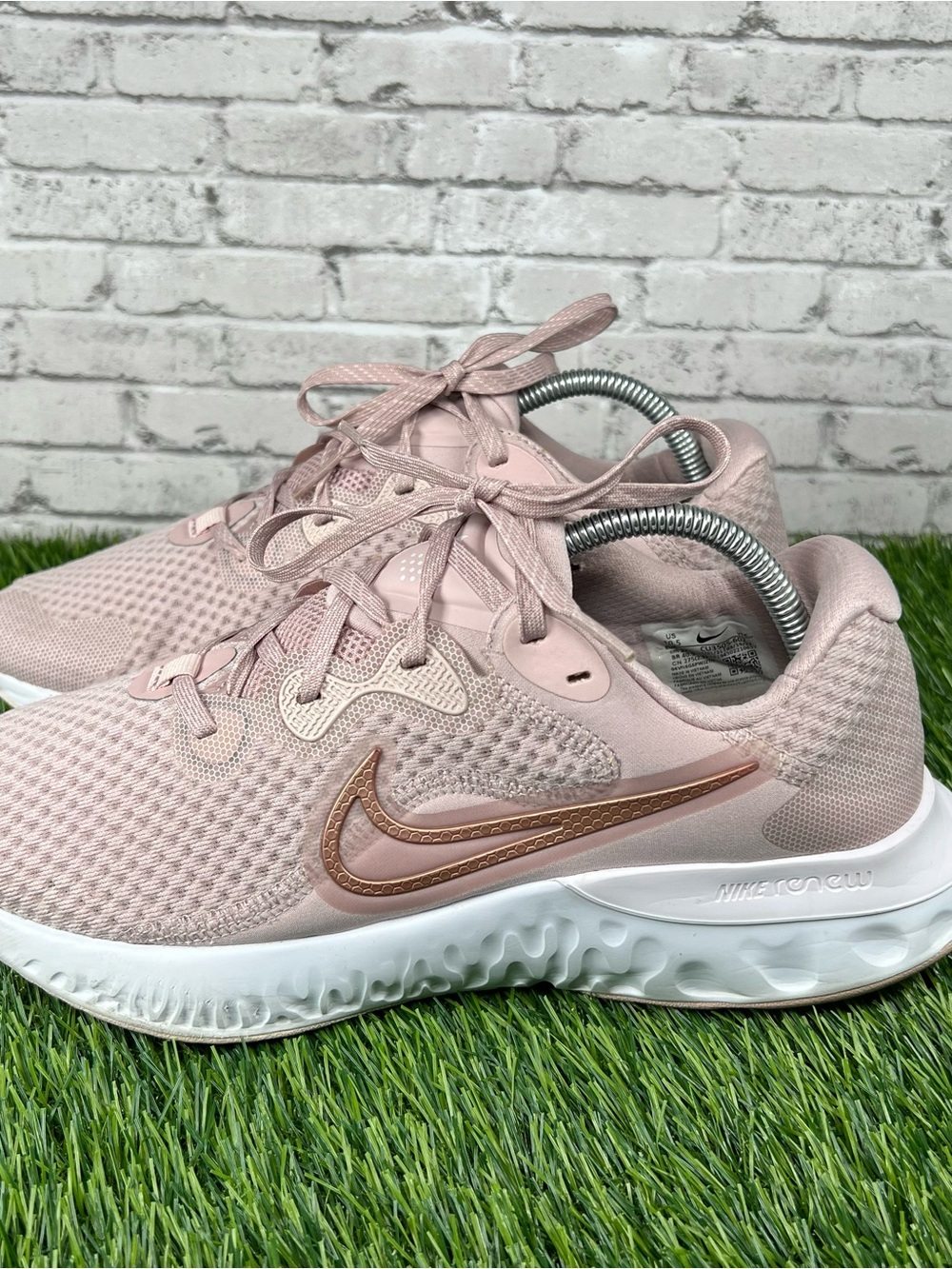 Nike Women’s Pink Mesh Running Sneakers with Rose-Gold Swoosh